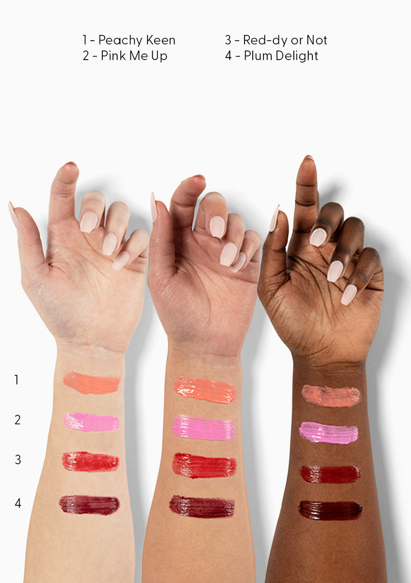 Three arms of diverse skin tones showcased against a white background, each featuring texture swatches of various shades of AvryBeauty’s Lip & Cheek Tinted Balms.