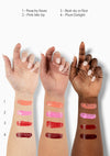 Three arms of diverse skin tones displaying swatches of each shade of AvryBeauty’s Lip & Cheek Tinted Balms, against a clean white background.