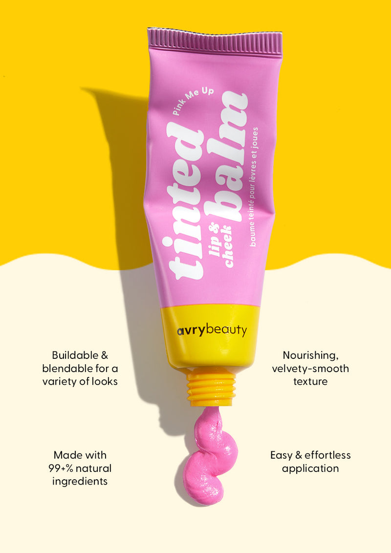 AvryBeauty’s Pink Me Up Vegan Lip & Cheek Tinted Balm being squeezed out of its tube onto a beige and yellow background, with four callouts detailing its skin benefits.