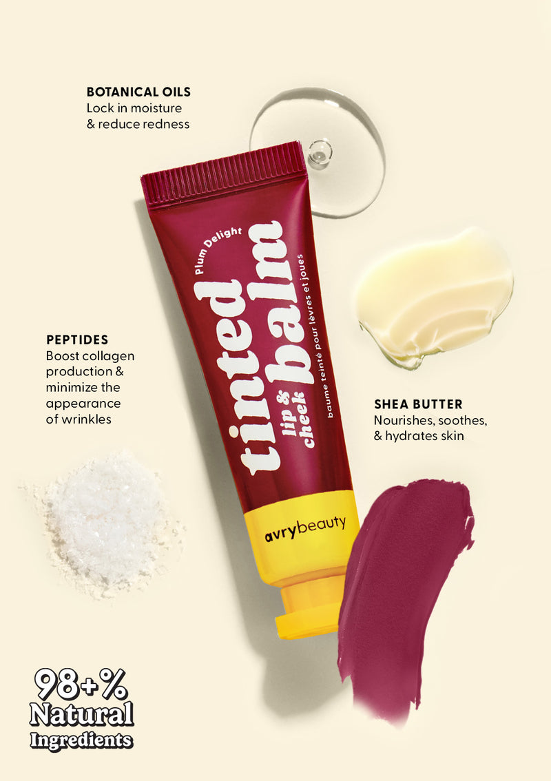 AvryBeauty’s Plum Lip & Cheek Tinted Balm tube and texture swipe on a beige background, surrounded by its key vegan skincare ingredients: shea butter, botanical oils, and peptides.